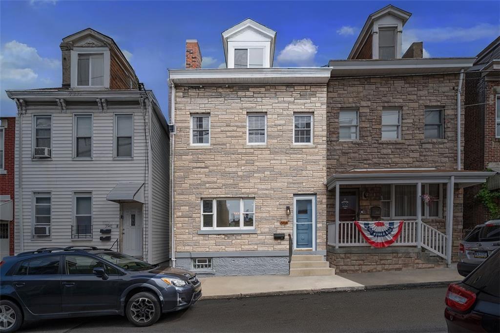 3943 Howley Street Pittsburgh, PA 15224 - Photo 32 of 32 a car parked in front of a building
