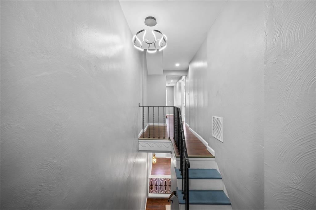 3943 Howley Street Pittsburgh, PA 15224 - Photo 8 of 32 a view of entryway and hall with a front door