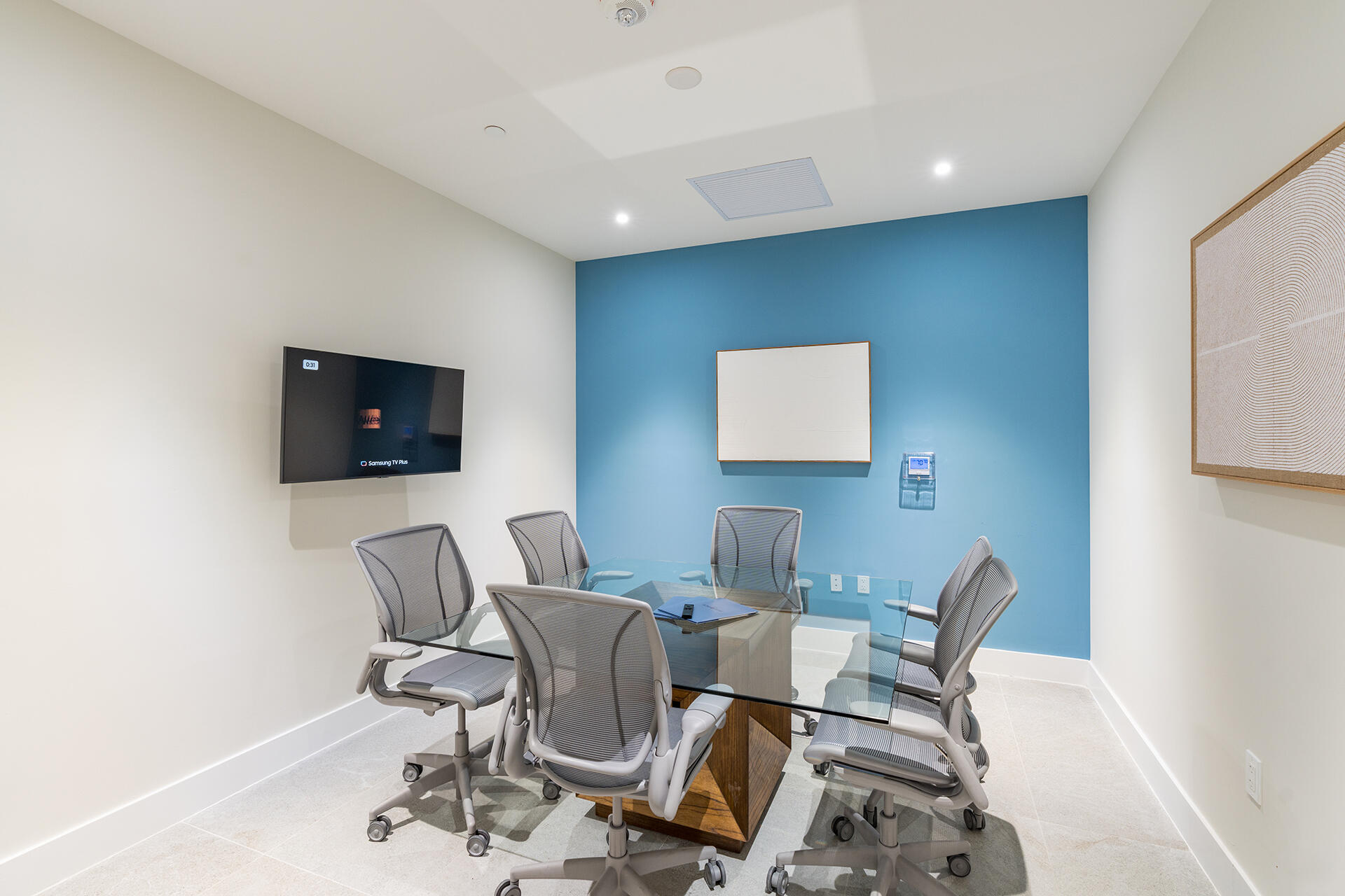 5961 Southwest 68th Street, Unit 711 South Miami, FL 33143 - Photo 11 of 21 a view of a workspace with furniture and wooden floor