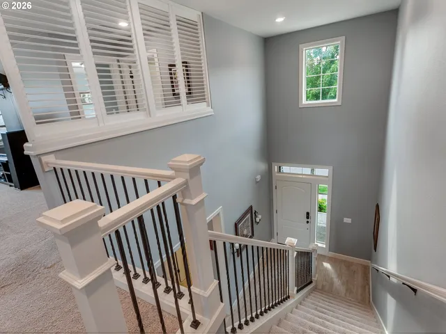 a view of a room with wooden deck