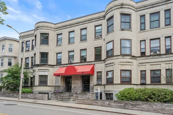 a front view of multi story residential apartment building
