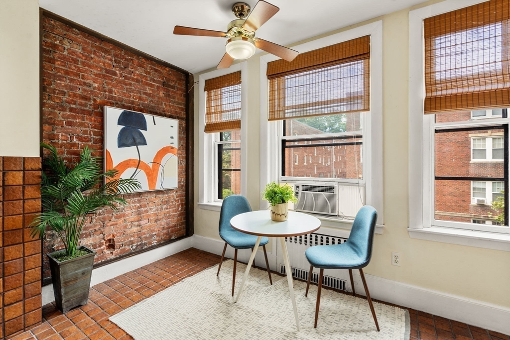 37 St Paul Street, Unit 3 Brookline, MA 02446 - Photo 4 of 13 a workspace with furniture and a window