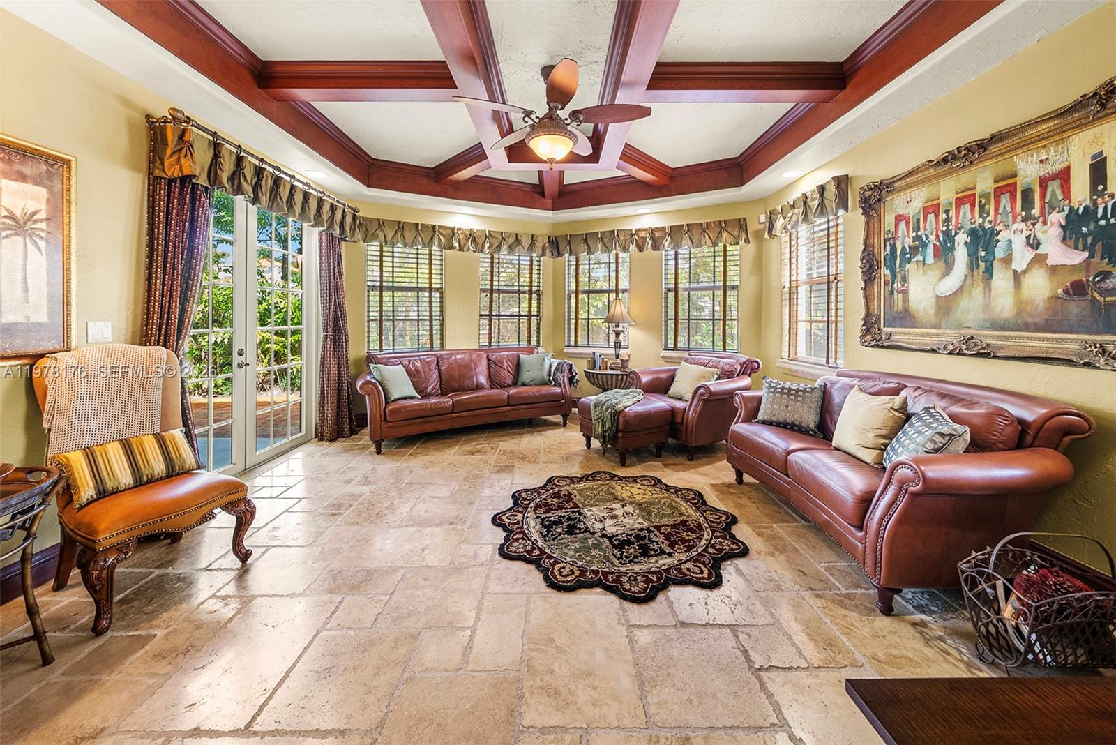 4501 North Bay Road Miami Beach, FL 33140 - Photo 8 of 24 a living room with furniture and a large window
