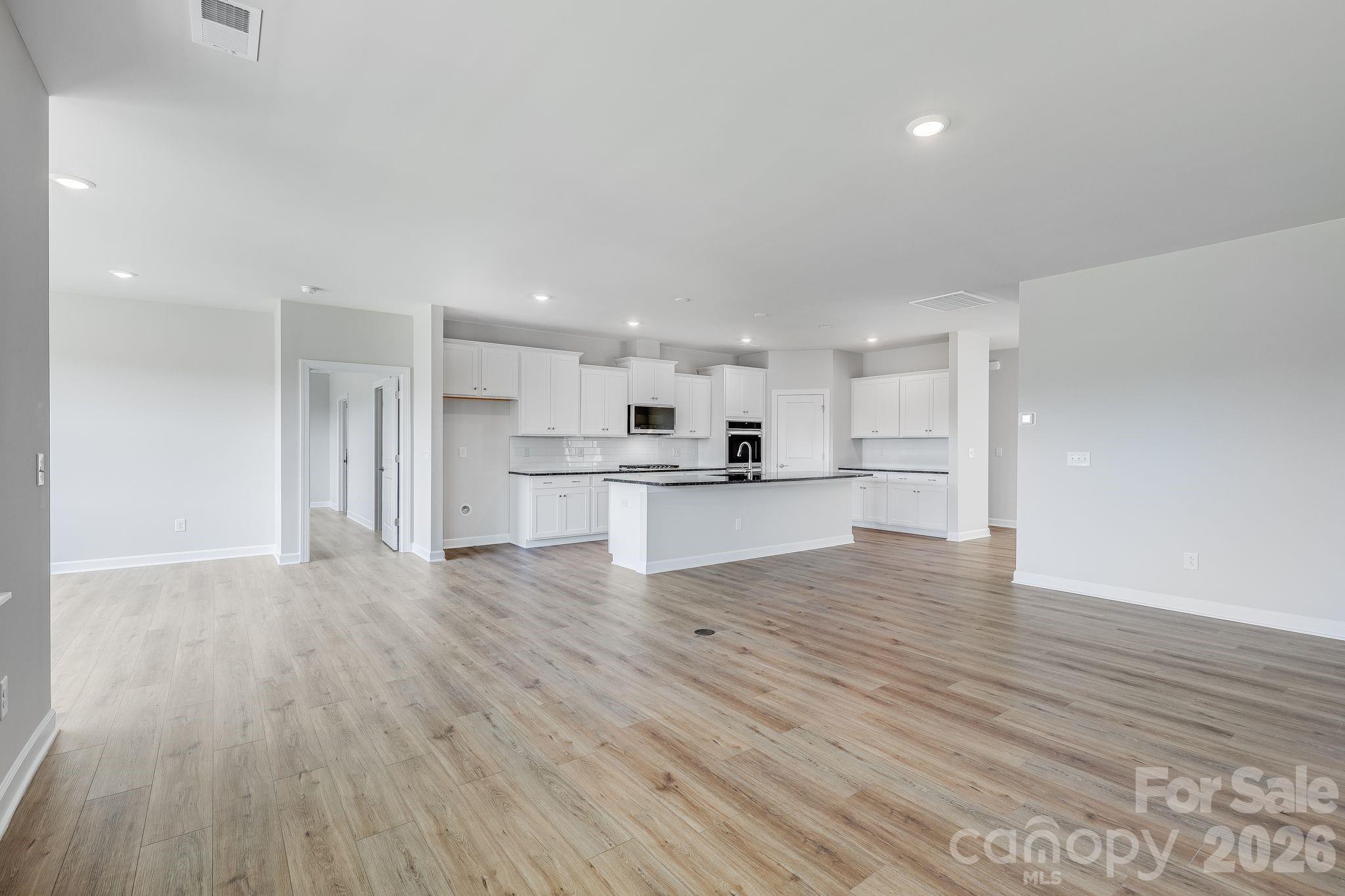 2287 Moon Crst Road, Unit 143 Lancaster, SC 29720 - Photo 14 of 35 a view of kitchen with wooden floor