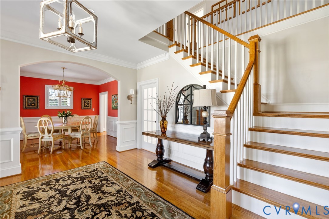 8947 Cherokee Road Richmond, VA 23235 - Photo 6 of 45 a view of entryway livingroom and hall with wooden floor