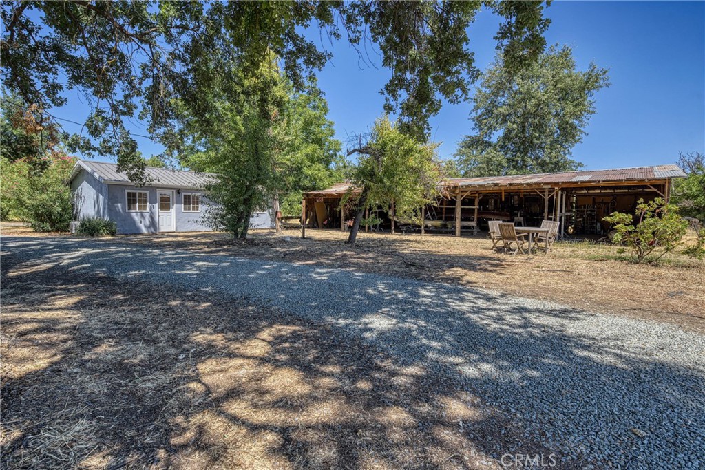 1980 Big Valley Road Lakeport, CA 95453 - Photo 48 of 56 a backyard of a house with yard and outdoor seating