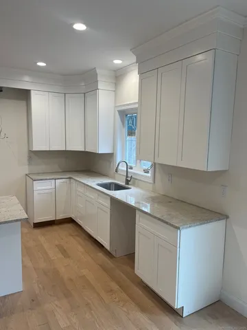 a large kitchen with cabinets