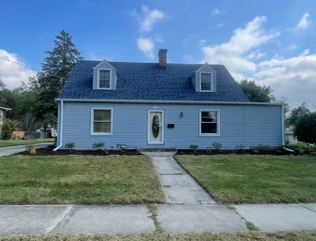 a view of a back yard of the house