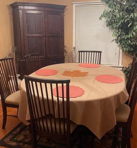 a table and chairs in a balcony