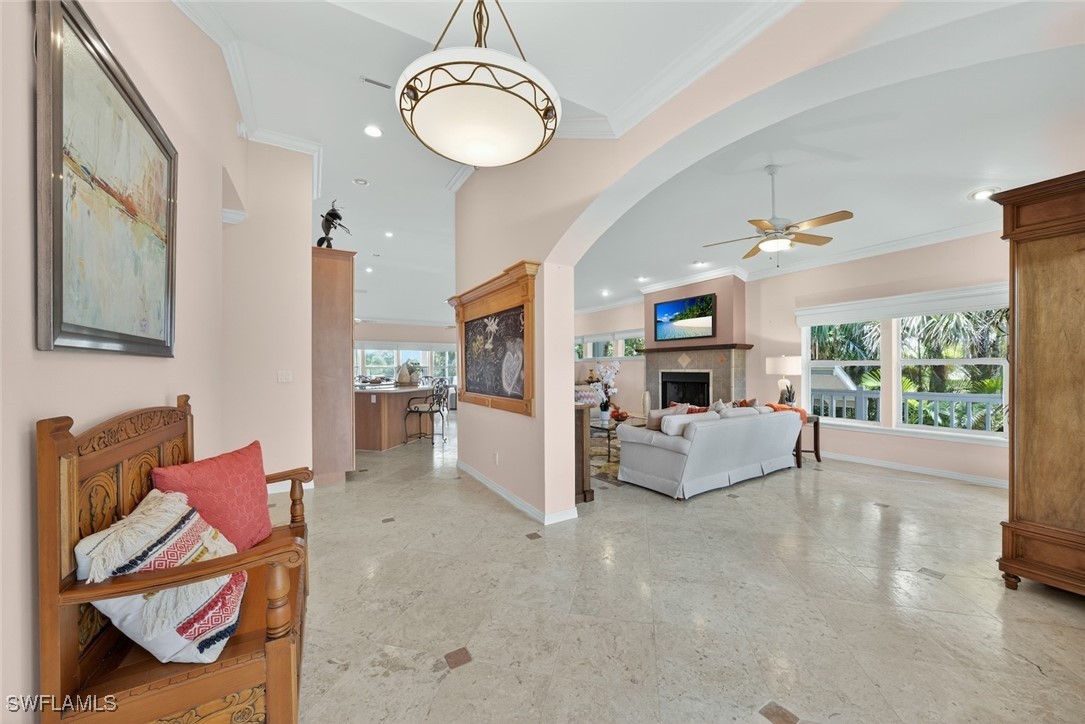 6120 Henderson Road Sanibel, FL 33957 - Photo 4 of 50 a living room with furniture and a large window
