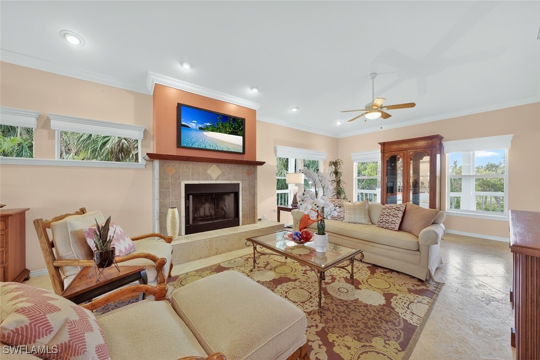 6120 Henderson Road Sanibel, FL 33957 - Photo 7 of 50 a living room with furniture and a fireplace