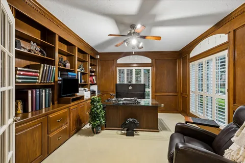 a view of a livingroom with furniture