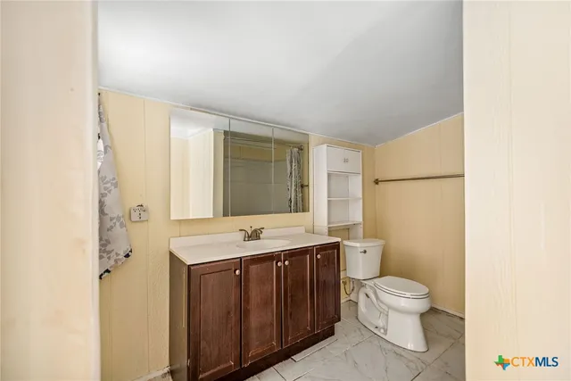 a view of livingroom with furniture and windows