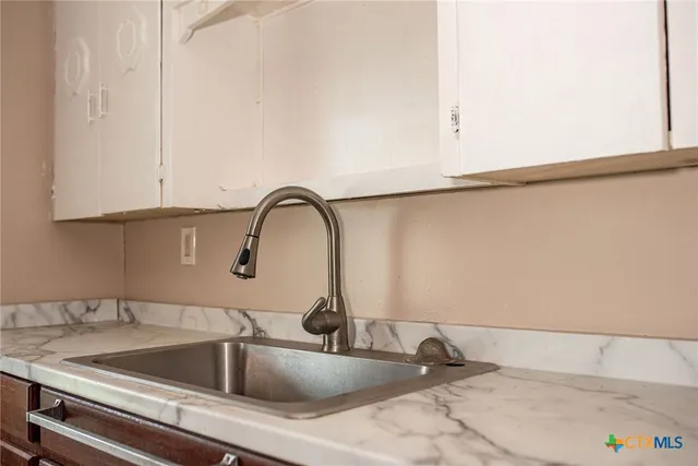 a view of a livingroom with a window