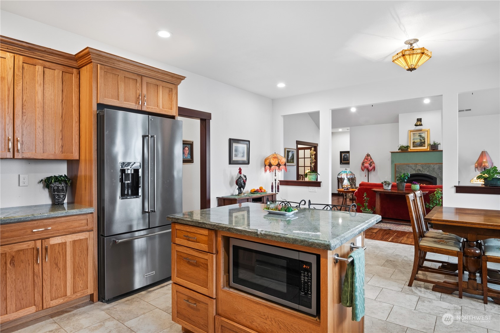 3011 Stella Road Longview, WA 98632 - Photo 13 of 38 a kitchen with stainless steel appliances a stove refrigerator and a sink