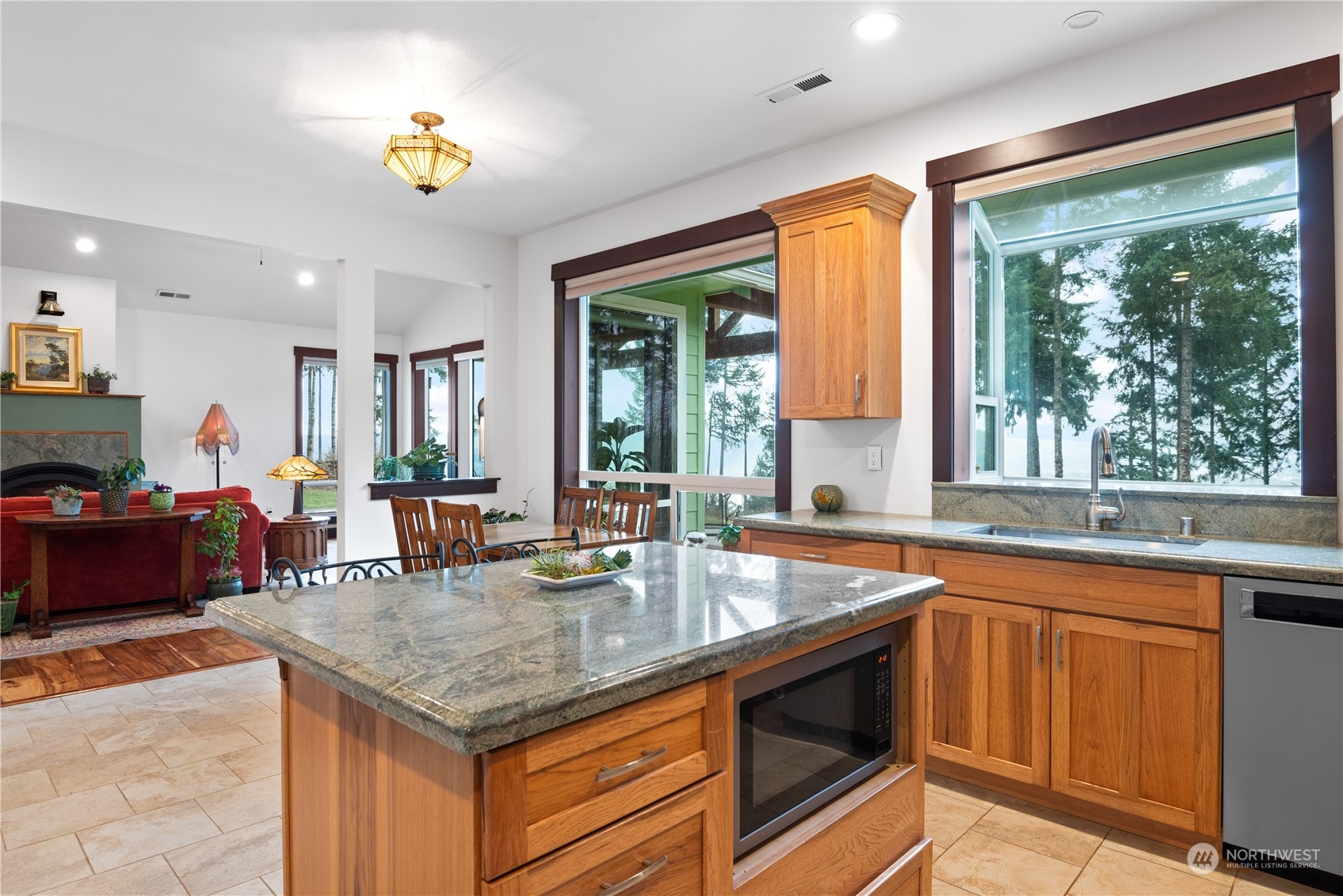 3011 Stella Road Longview, WA 98632 - Photo 14 of 38 a kitchen with a stove a sink and a counter space