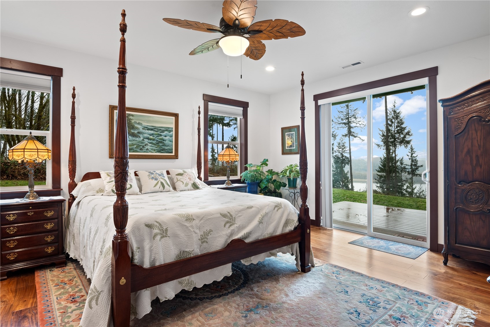 3011 Stella Road Longview, WA 98632 - Photo 17 of 38 a bed sitting in a bedroom next to a large window