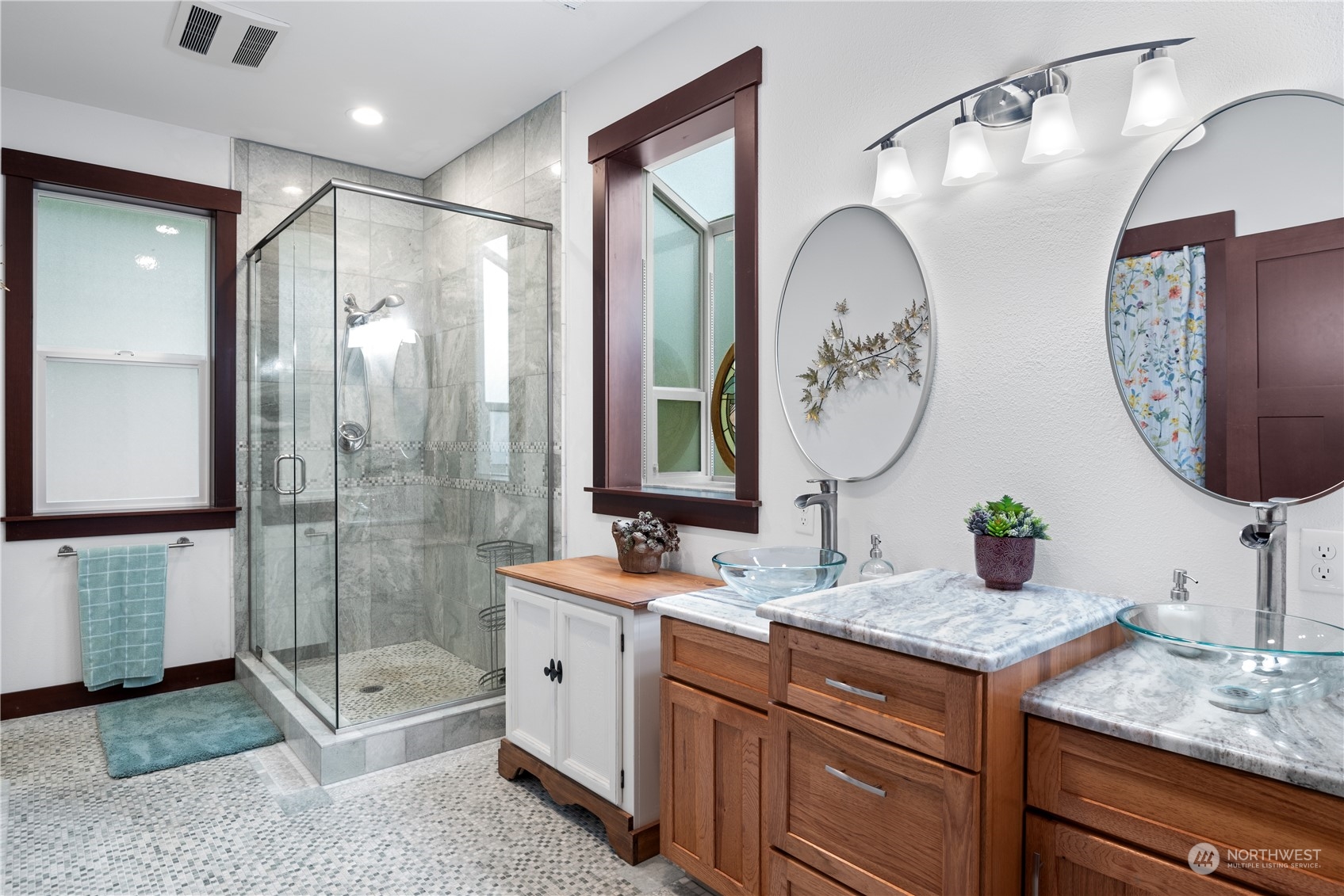 3011 Stella Road Longview, WA 98632 - Photo 20 of 38 a bathroom with a double vanity sink and a mirror