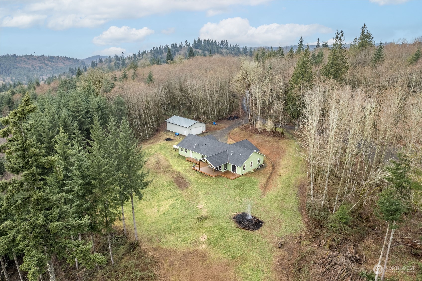 3011 Stella Road Longview, WA 98632 - Photo 38 of 38 a view of a lake with a mountain in the background