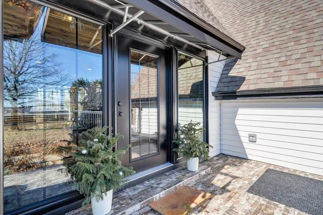 a kitchen with stainless steel appliances kitchen island granite countertop a sink and cabinets