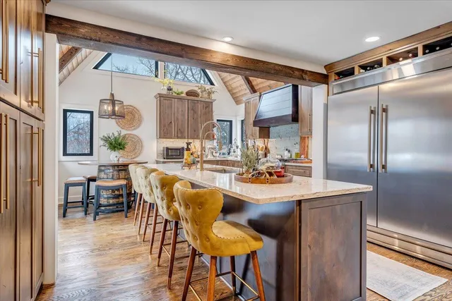 a spacious bathroom with a double vanity sink and a mirror