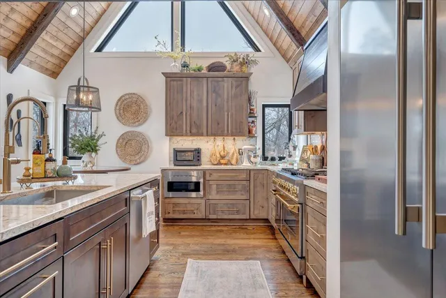 a bed room with furniture and a chandelier