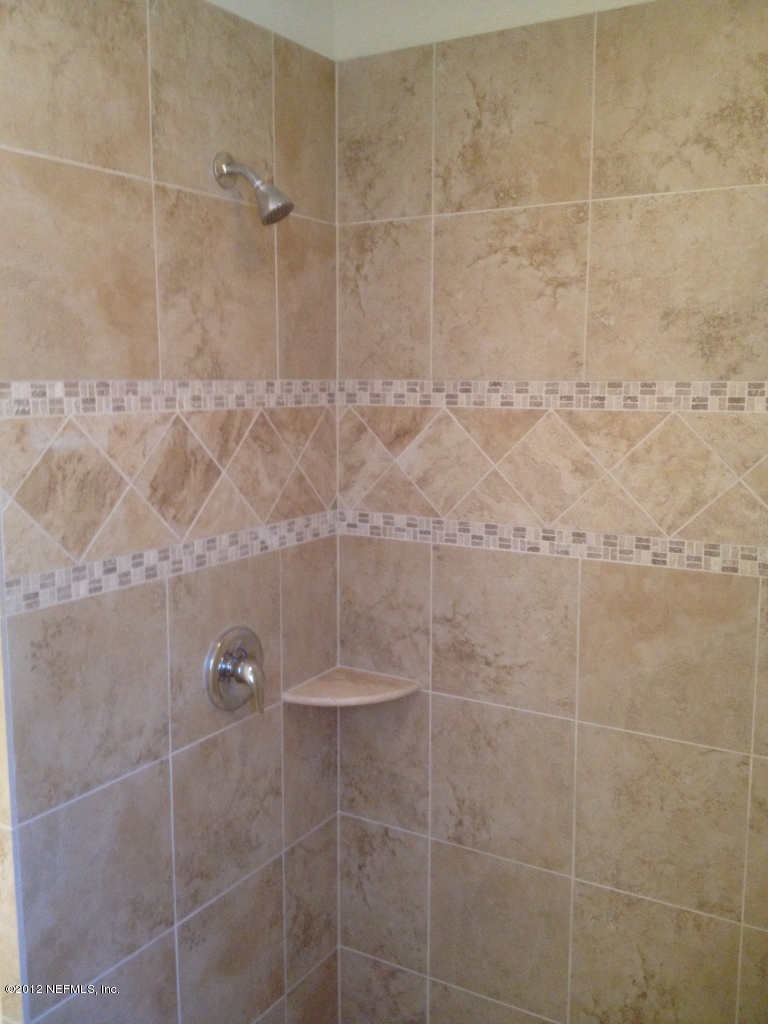 2753 Anniston Road Jacksonville, FL 32246 - Photo 18 of 37 Master Shower Tile & Plumbing Detail
