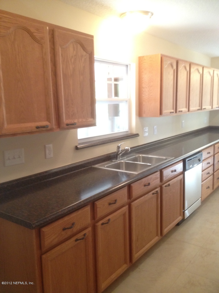 2753 Anniston Road Jacksonville, FL 32246 - Photo 8 of 37 Kitchen with Window over the sink