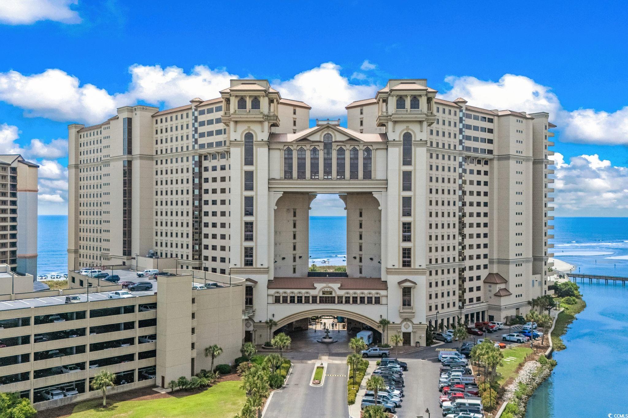 100 North Beach Boulevard, Unit 1803 North Myrtle Beach, SC 29582 - Photo 1 of 35 View of apartment building / complex featuring a water view