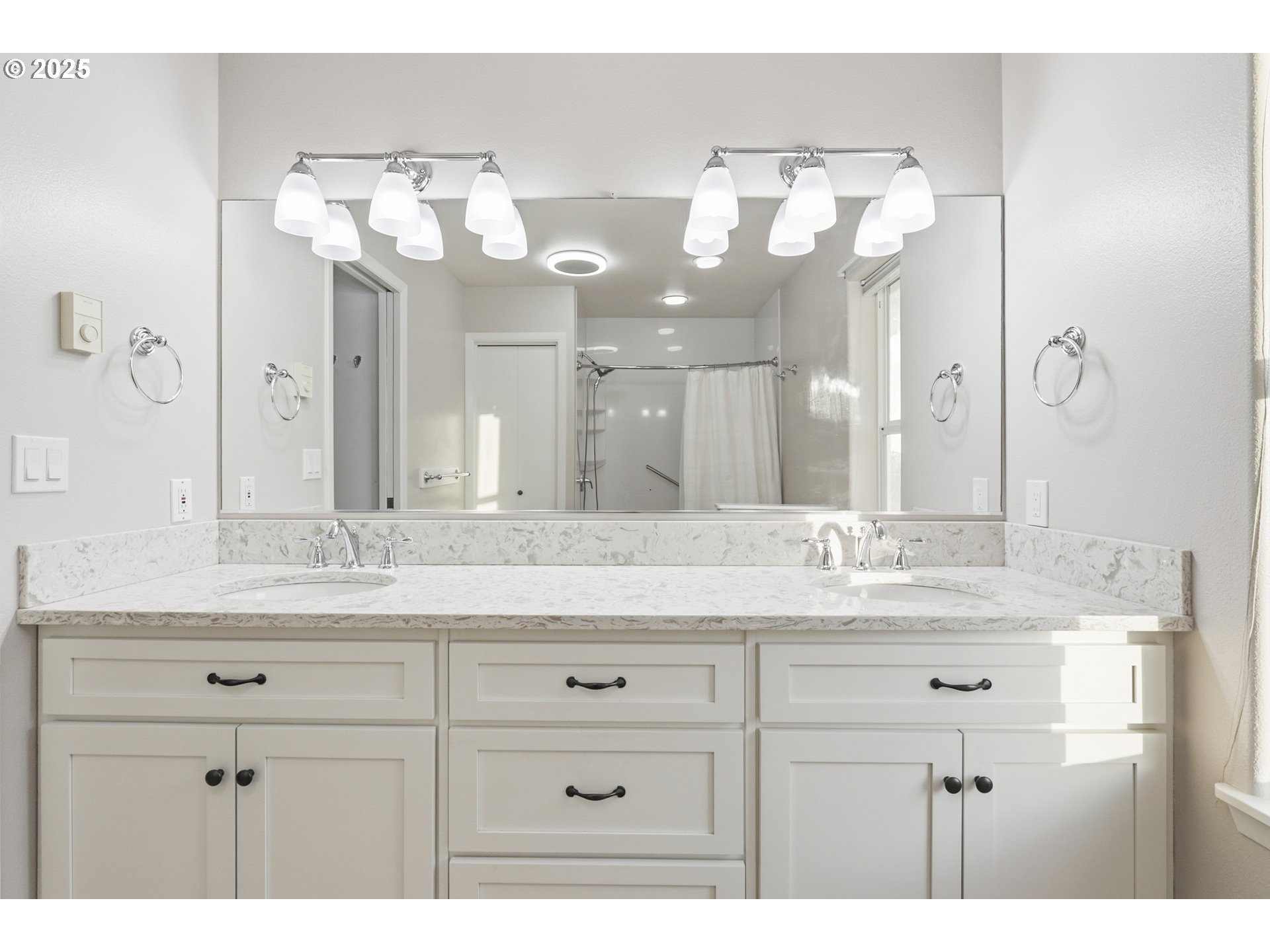 1533 Southwest 7th Circle Camas, WA 98607 - Photo 12 of 27 a bathroom with a granite countertop sink a large mirror and a shower