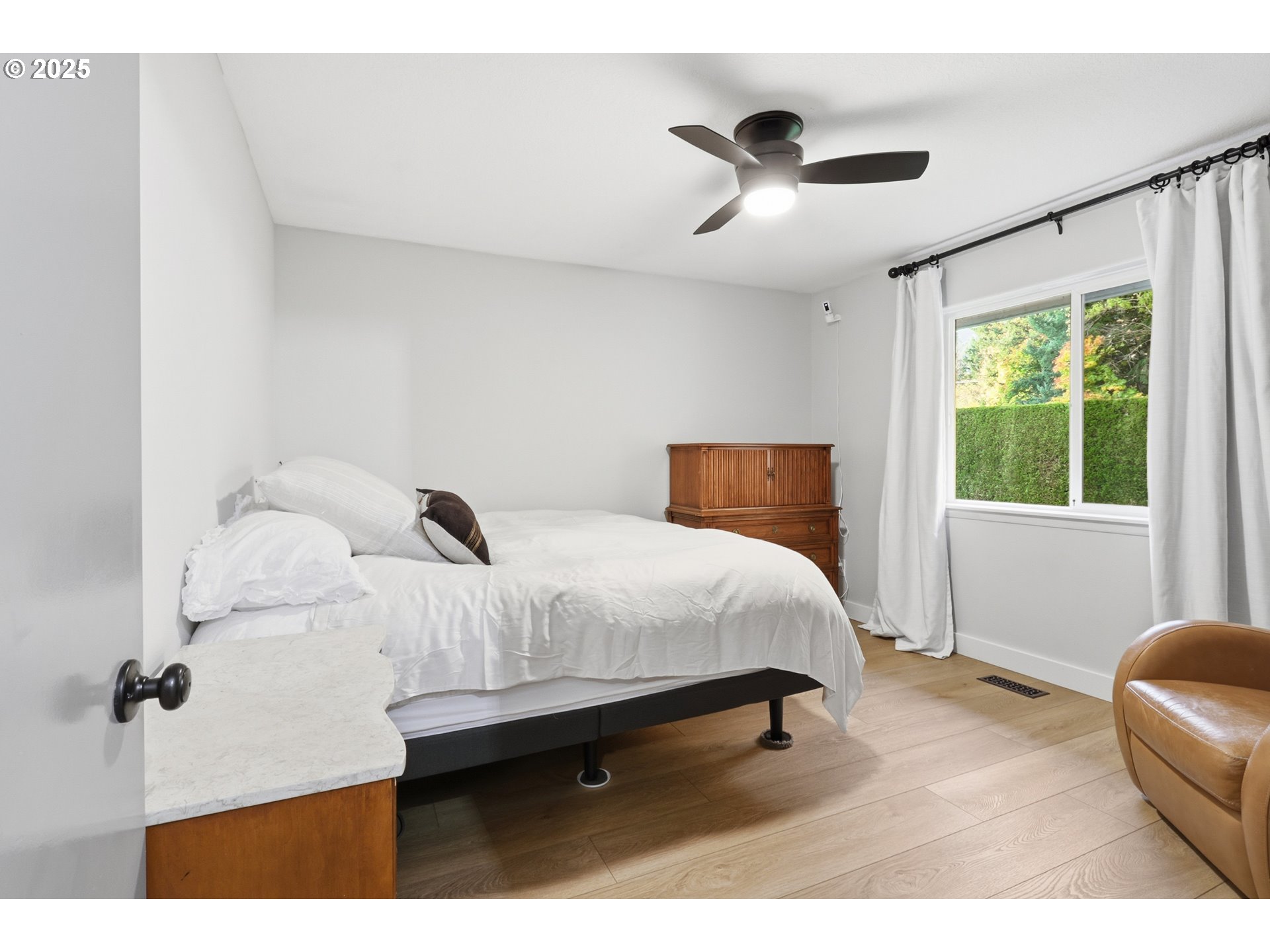 1533 Southwest 7th Circle Camas, WA 98607 - Photo 15 of 27 a bedroom with a bed and window