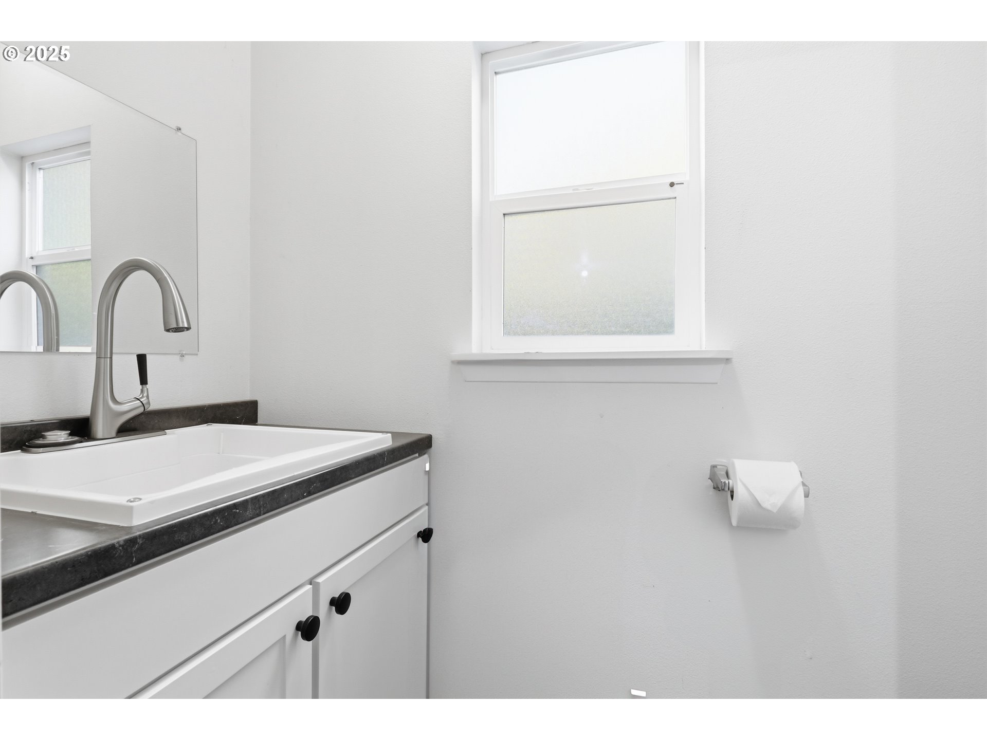 1533 Southwest 7th Circle Camas, WA 98607 - Photo 18 of 27 a bathroom with a sink and a mirror