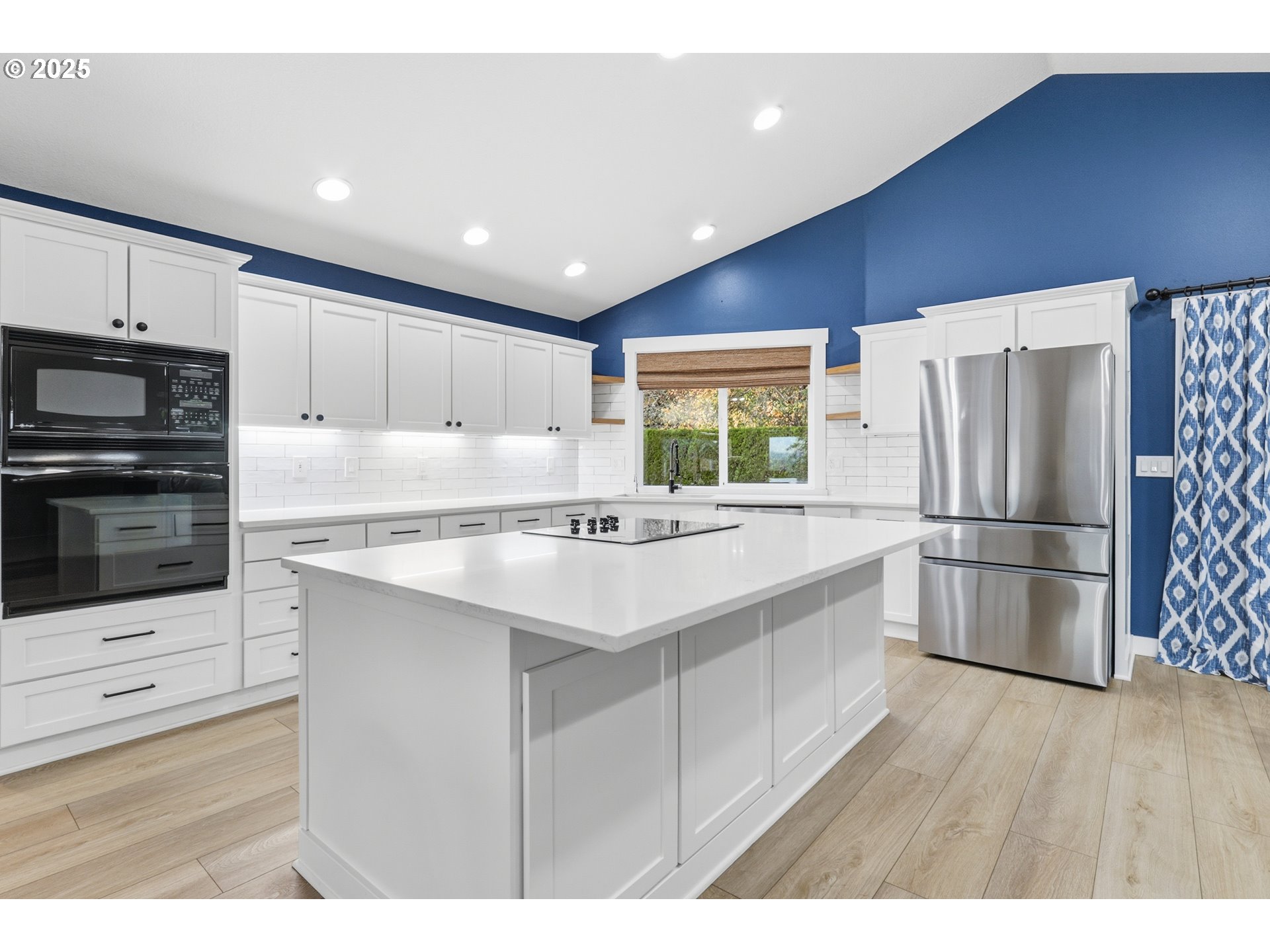 1533 Southwest 7th Circle Camas, WA 98607 - Photo 6 of 27 a kitchen with stainless steel appliances granite countertop a refrigerator and a stove top oven