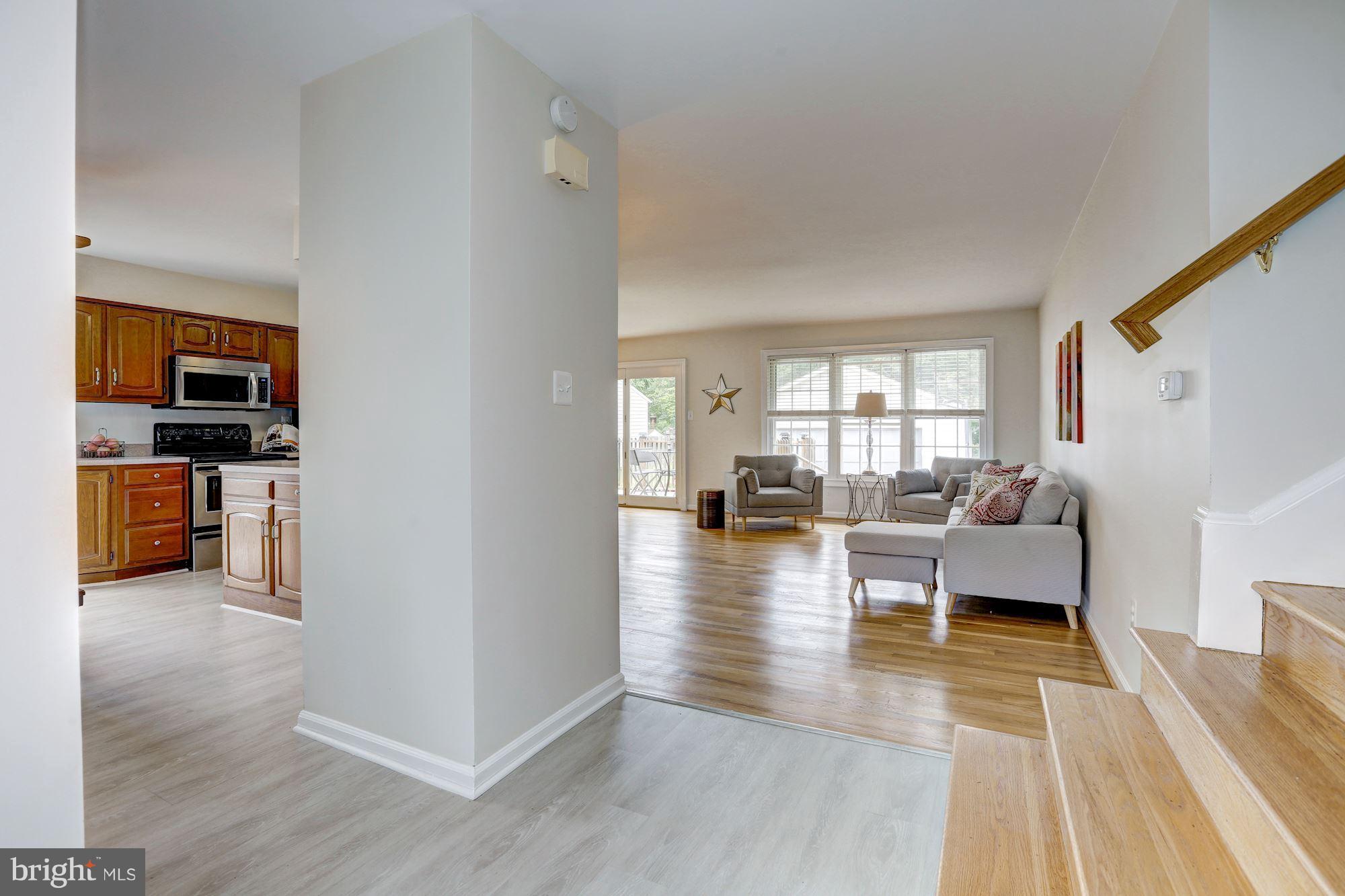 8813 Fort Hunt Road Alexandria, VA 22308 - Photo 4 of 30 Living room & kitchen from entryway