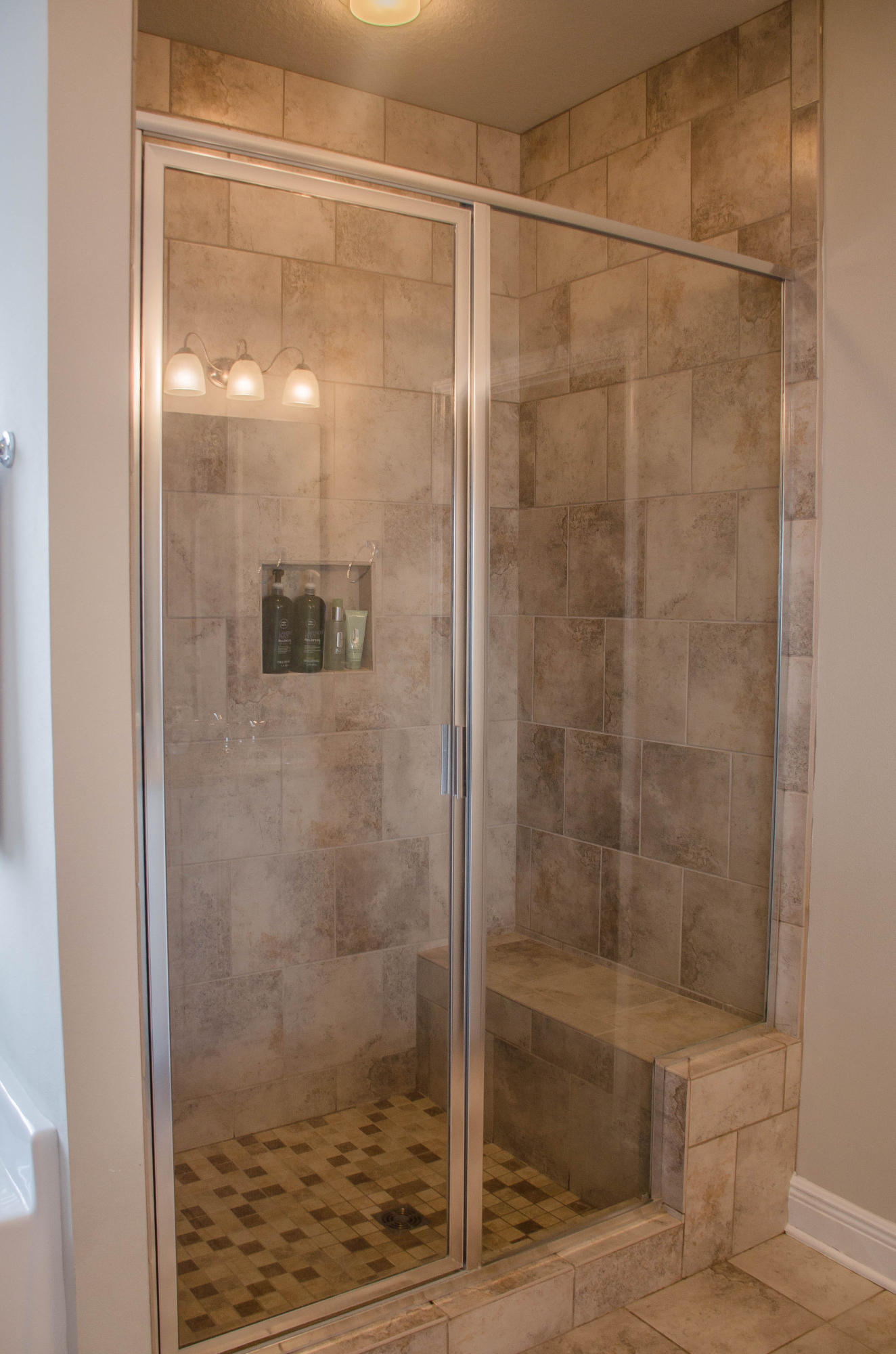 513 Gadwell Street Crestview, FL 32539 - Photo 29 of 49 a bathroom with a glass shower door