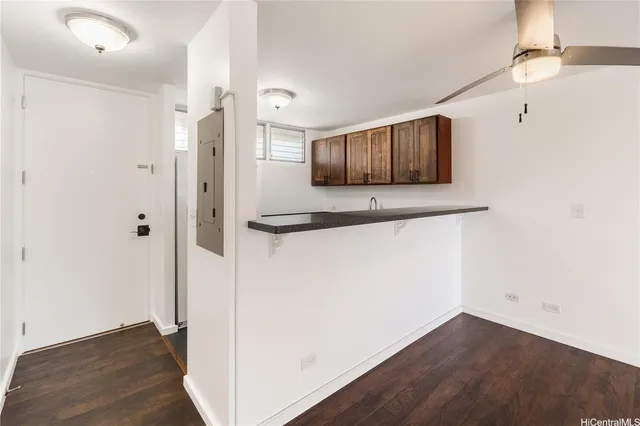 a view of a kitchen from the hallway