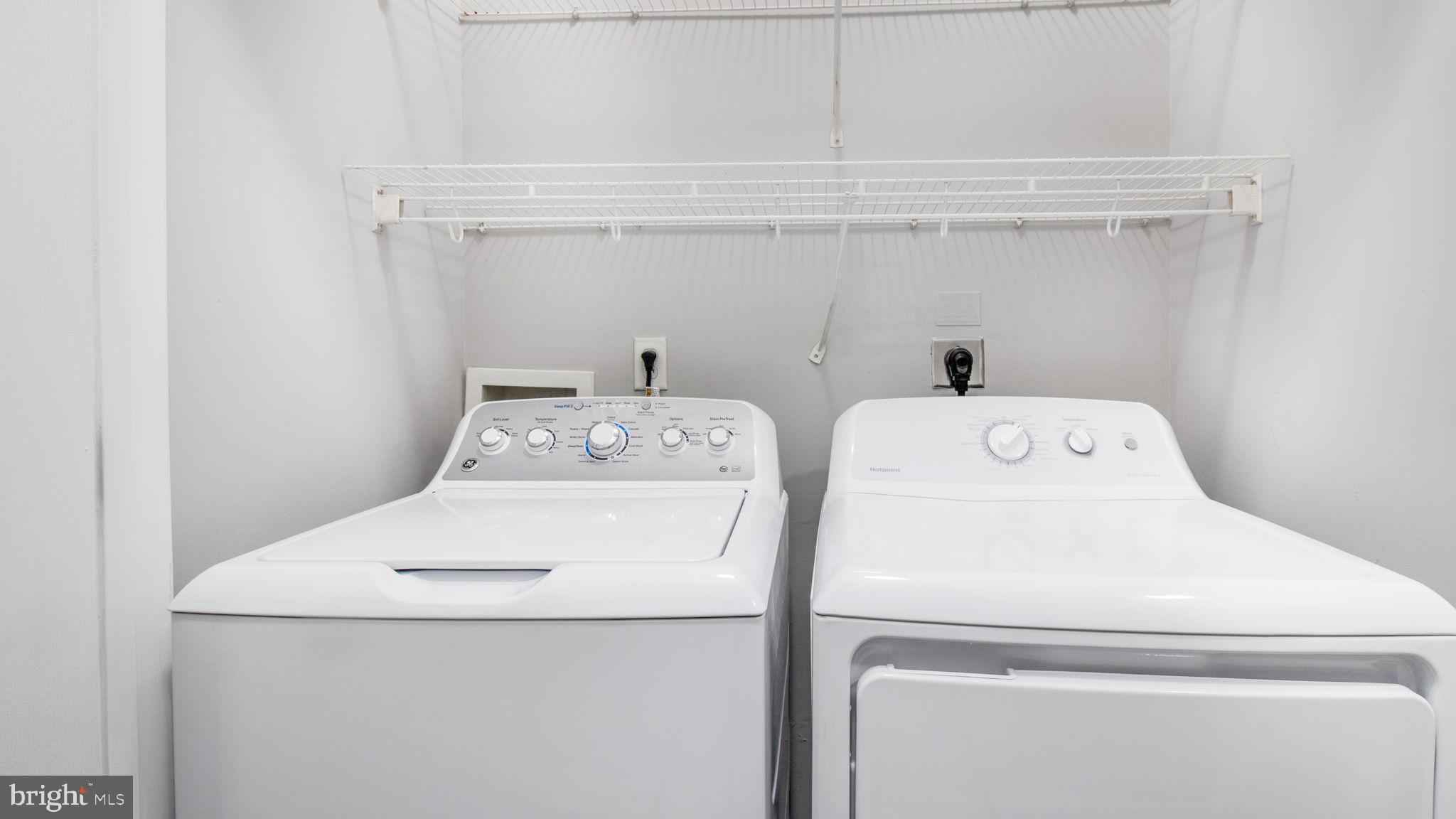 3 Arch Place, Unit 130 Gaithersburg, MD 20878 - Photo 17 of 45 a utility room with dryer and washer