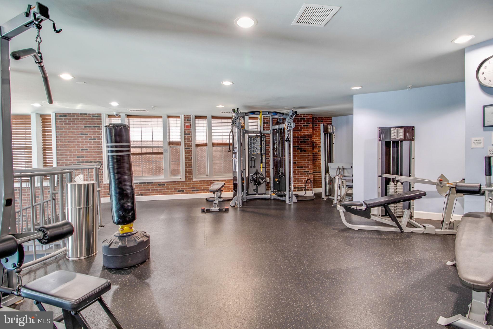 3 Arch Place, Unit 130 Gaithersburg, MD 20878 - Photo 38 of 45 a view of a room with gym equipment