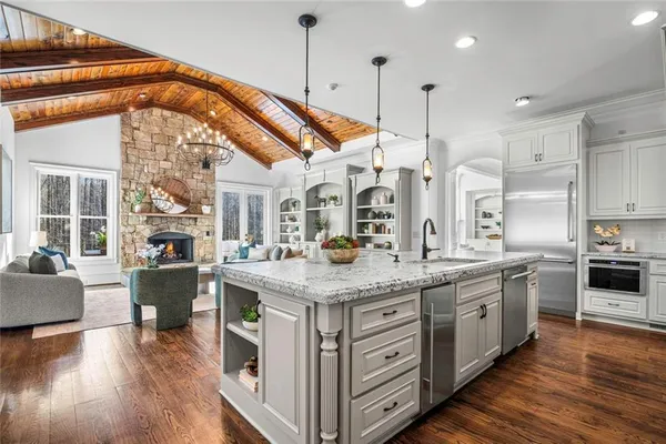 a living room with furniture flowerpot and a potted plant