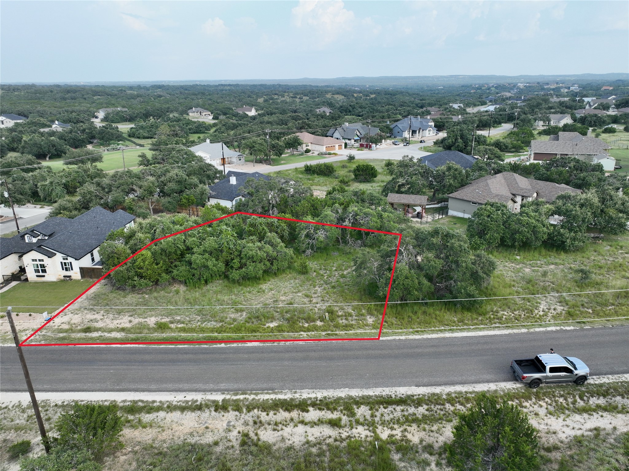 710 John Price Blanco, TX 78606 - Photo 17 of 25 an aerial view of residential houses with outdoor space and trees