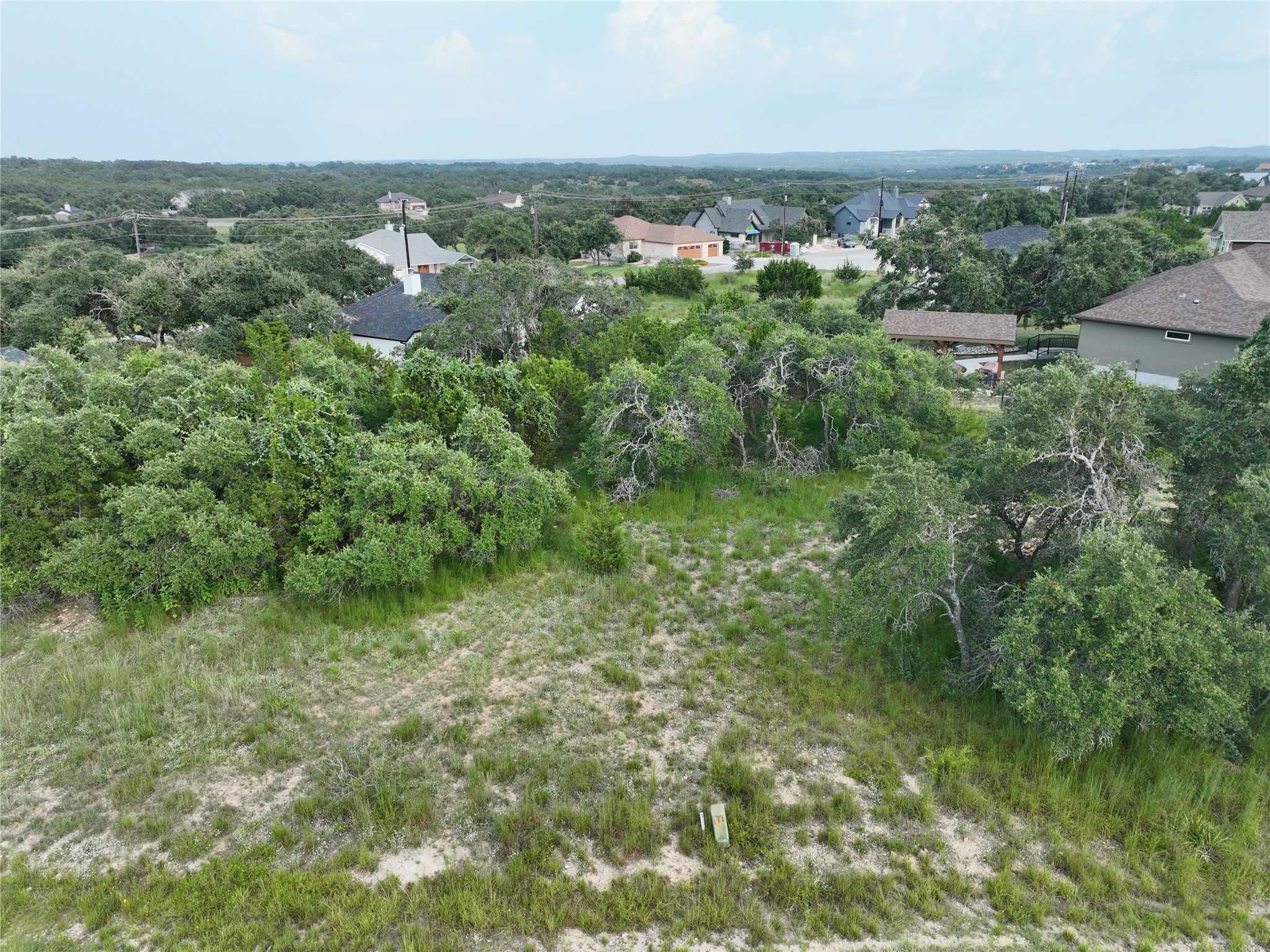 710 John Price Blanco, TX 78606 - Photo 22 of 25 an aerial view of residential houses with outdoor space and trees