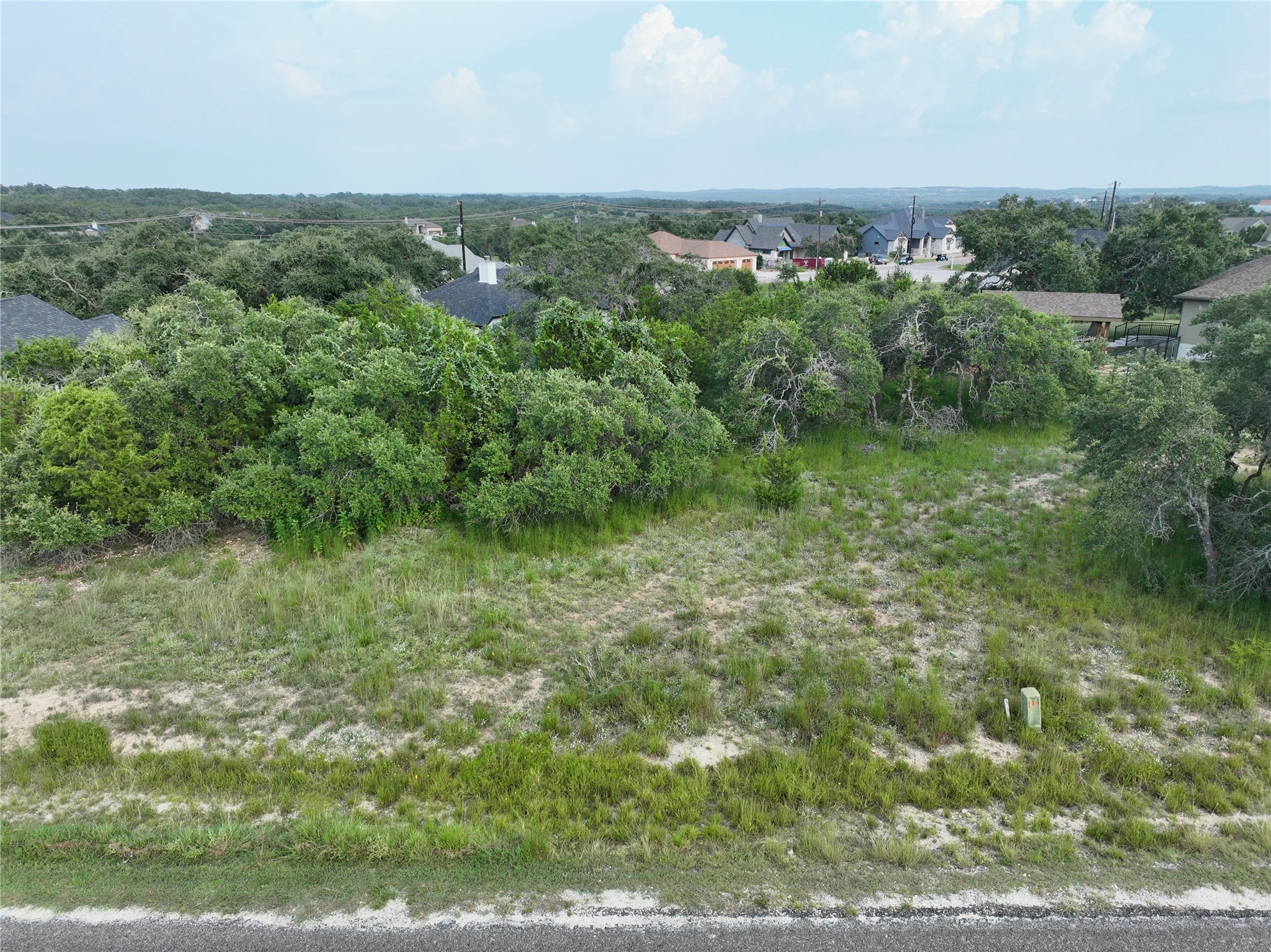 710 John Price Blanco, TX 78606 - Photo 23 of 25 a view of a green field with lots of trees