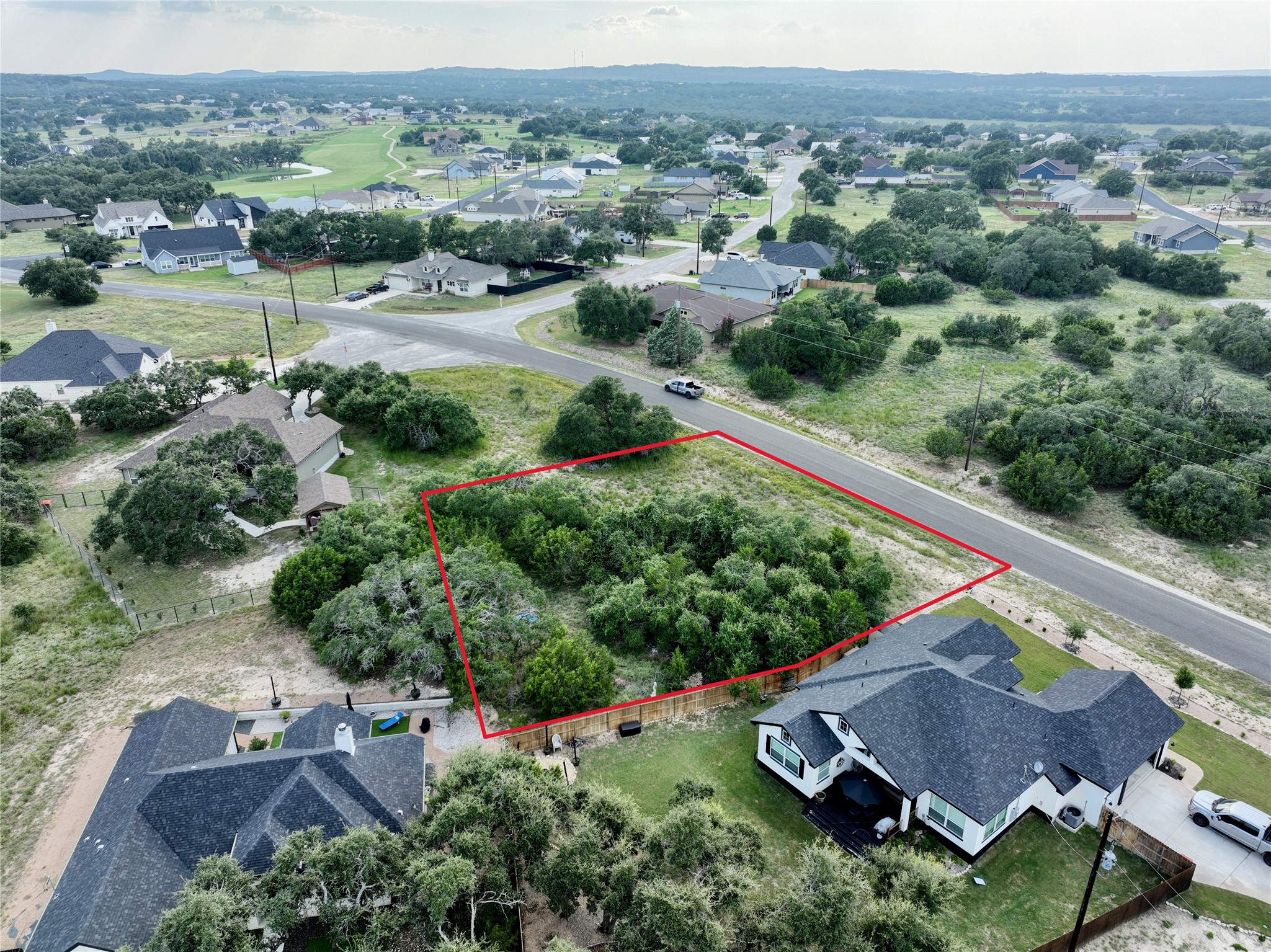 710 John Price Blanco, TX 78606 - Photo 10 of 25 an aerial view of green landscape with trees houses and mountain view