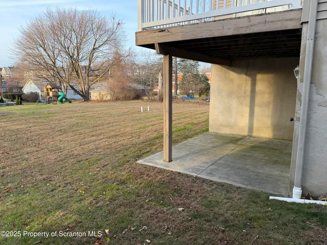 a view of backyard with green space