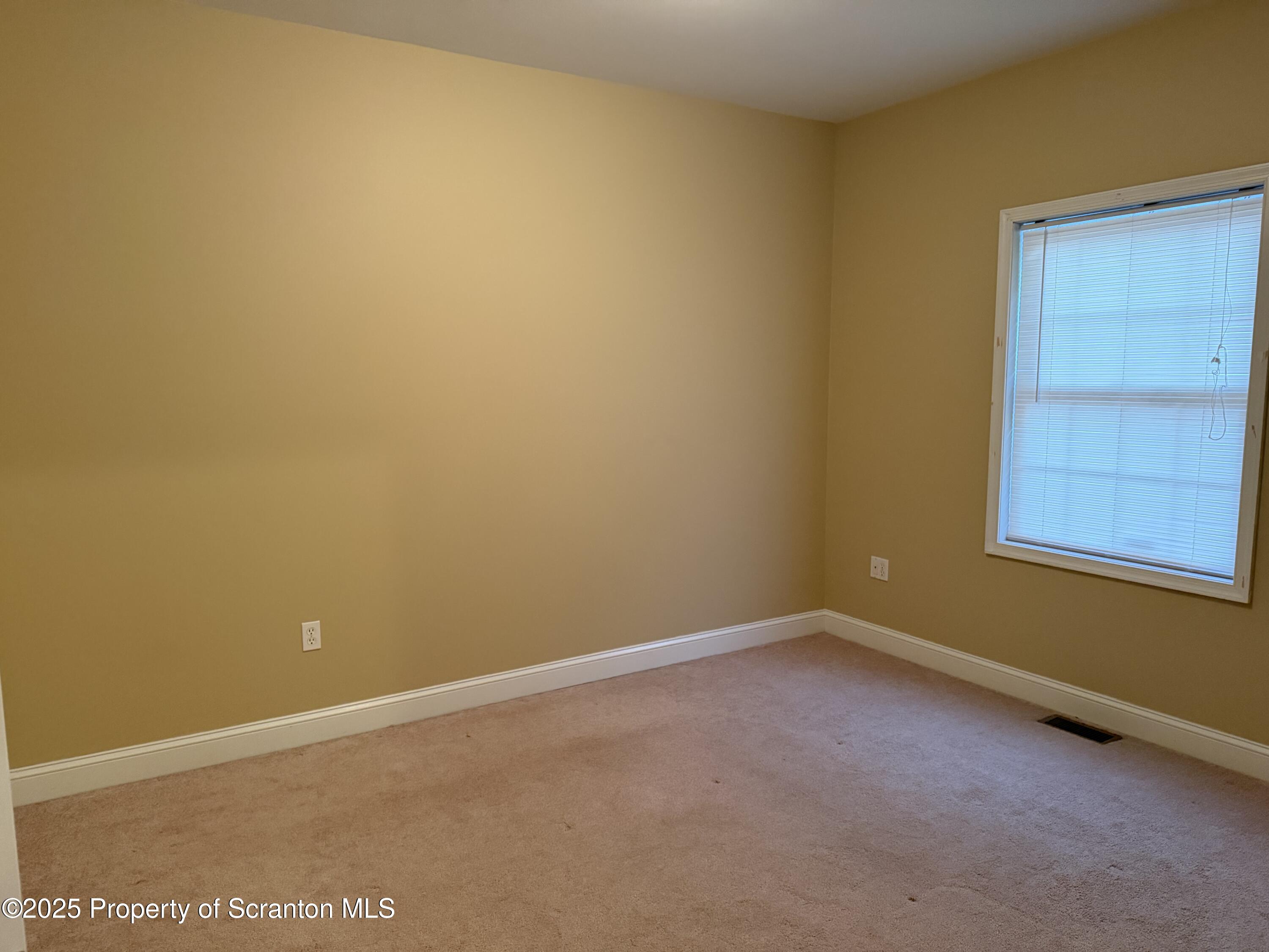 617 Arthur Avenue Scranton, PA 18510 - Photo 9 of 15 a view of an empty room with a window