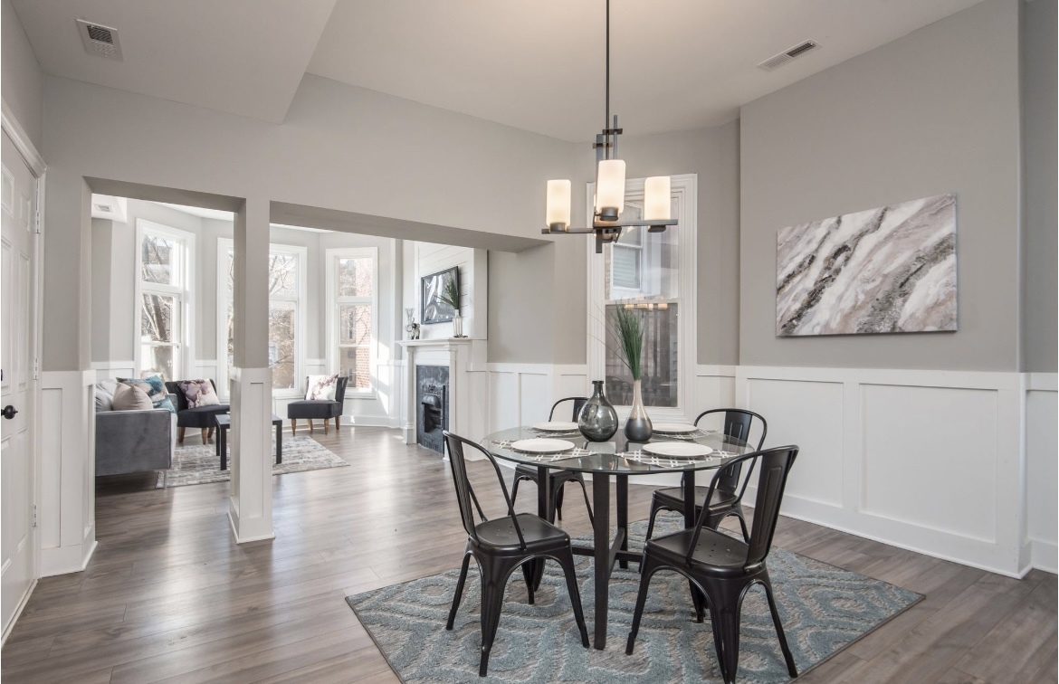 6607 South Ingleside Avenue Chicago, IL 60637 - Photo 14 of 28 a view of a dining room with furniture window and wooden floor
