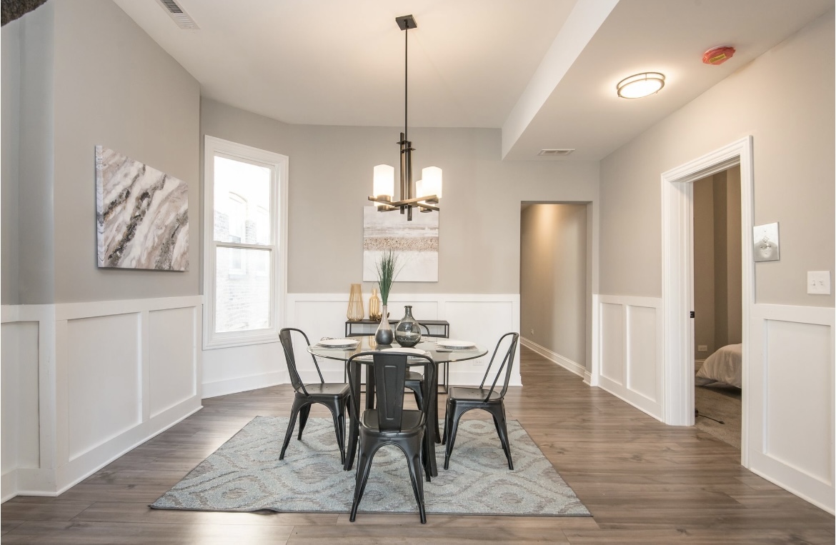6607 South Ingleside Avenue Chicago, IL 60637 - Photo 15 of 28 a view of a dining room with furniture window and wooden floor