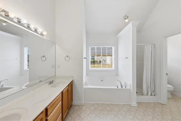 a view of a livingroom with a bathroom