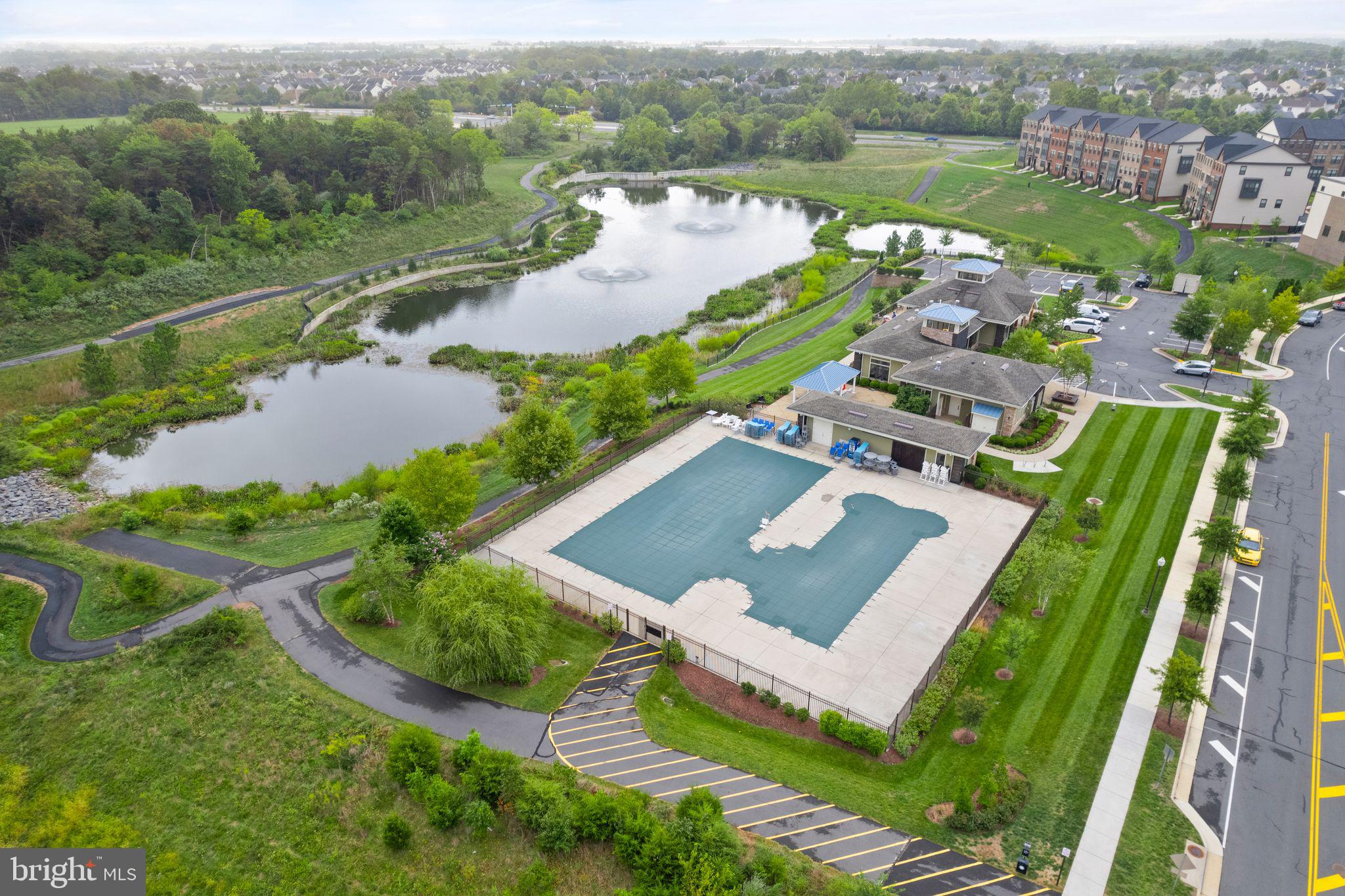 22438 Morning Shade Terrace Ashburn, VA 20148 - Photo 34 of 41 Aerial view of clubhouse, pool, pond