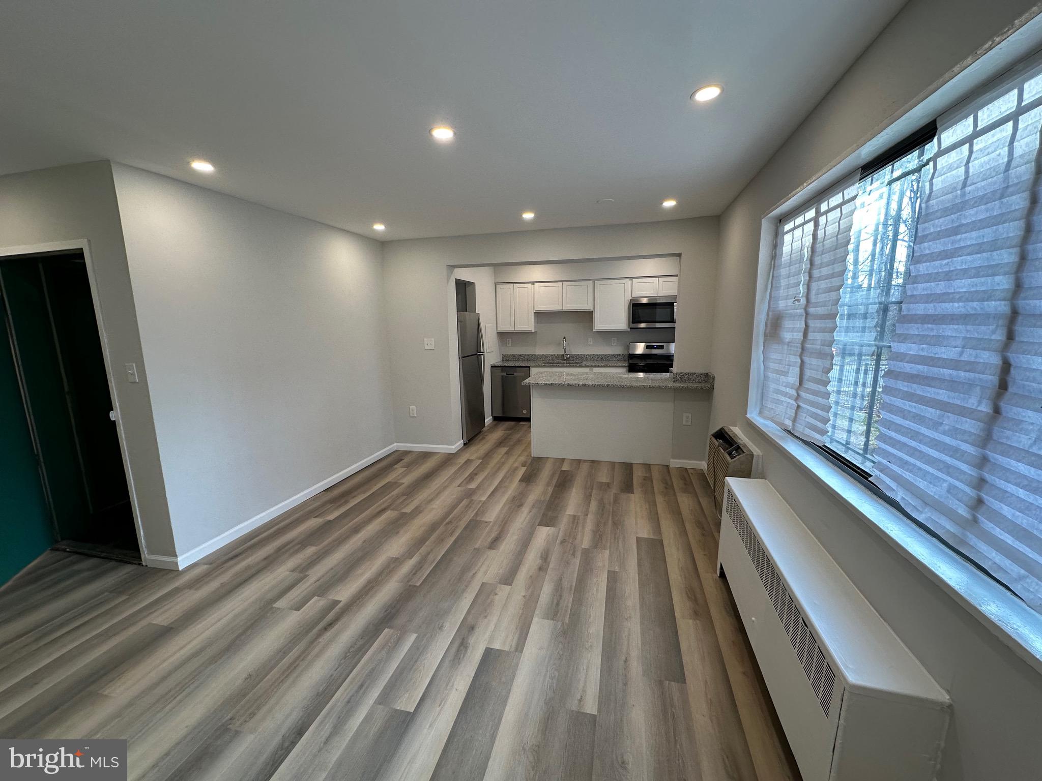 4733 1st Street Southwest, Unit 102 Washington, DC 20032 - Photo 5 of 11 Living Rm
